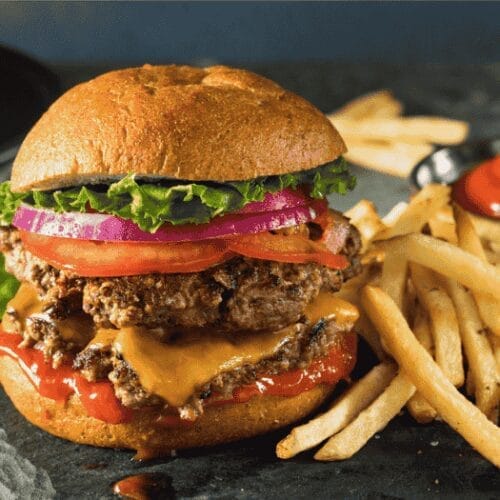 Classic cheeseburger with melted cheese, onions, and homemade fries – Complete recipe